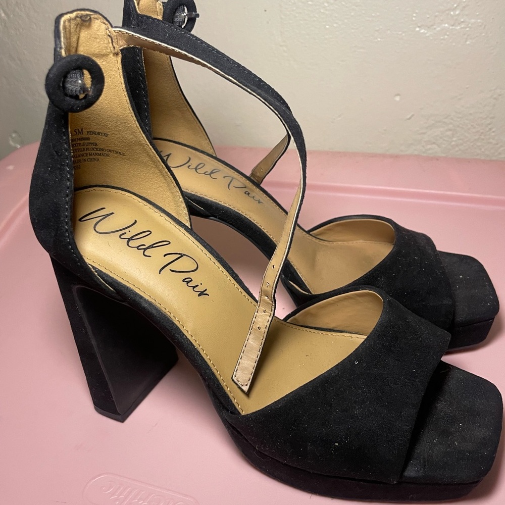 Black faux suede Wild pair 5.5 heels. Worn a few times. In good condition.